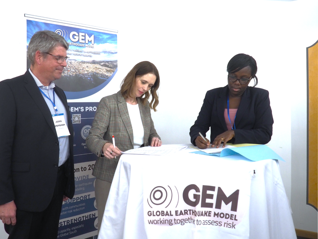 NBRB's Executive Secretary Flavia Bwiire (R) with GEM Foundation's Secretary General Helen Crowley (middle) and Chairperson of the GEM Governing Board Joerg Steffensen during the signing of the contract between the two bodies